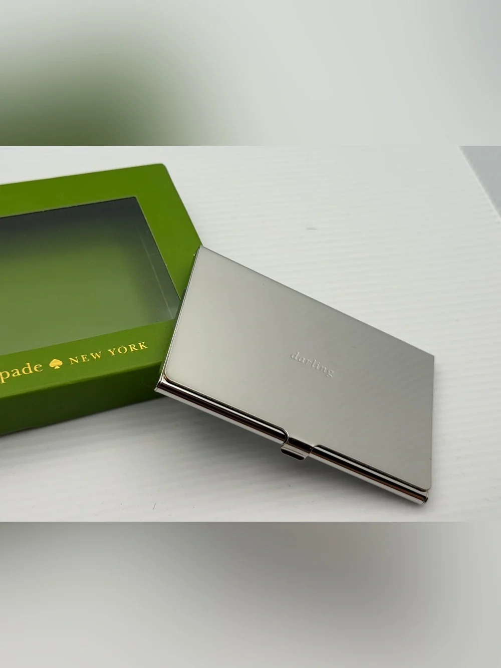 kate spade silver “darling” metal card case